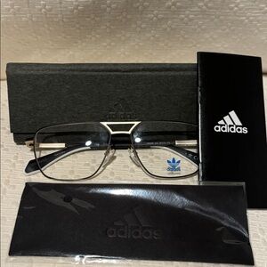 New Adidas OR5069 Matte Black Frame Glasses with Gold Detail 
New without tags